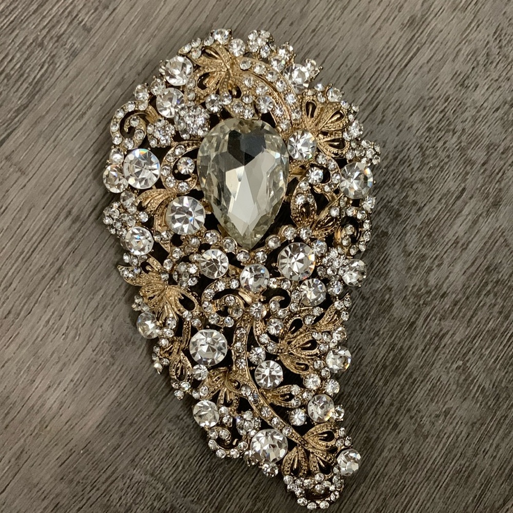 Large golden Paisley  gem stone brooch